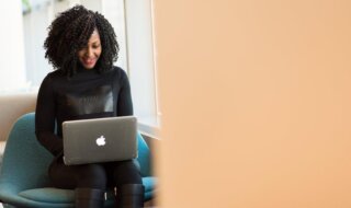 Woman Holding Macbook