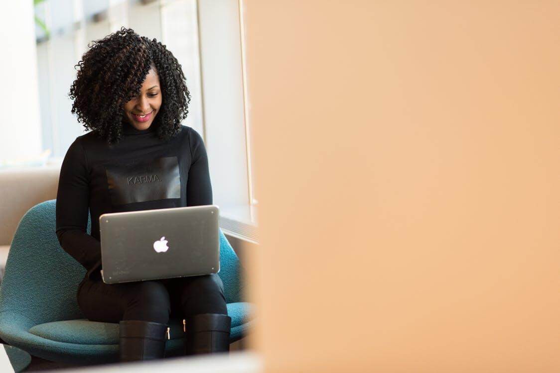 Woman Holding Macbook